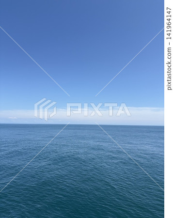 A ship's deck overlooking the blue sky and the sea. A ship's deck overlooking the blue sky and the sea. 141964147