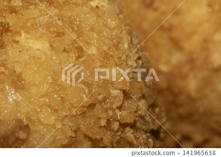 Close up of golden batter breadcrumbs close up 141965638