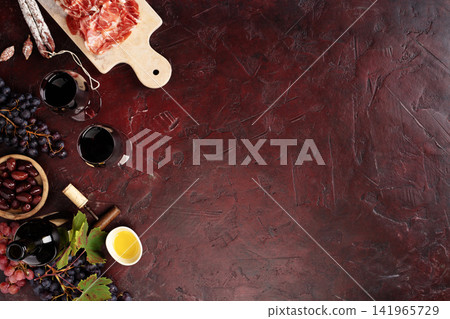 Wine and Charcuterie Corner on Dark Rustic Background Wine and Charcuterie Corner on Dark Rustic Background 141965729