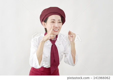Female pastry chef calling out to the public, against a white background. Female pastry chef calling out to the public, against a white background. 141966062