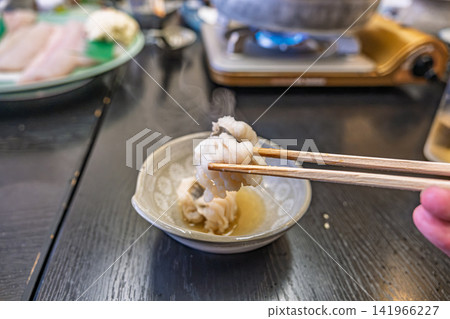 [#Food] A Japanese dish of steaming conger eel shabu-shabu to be enjoyed with chopsticks. 141966227