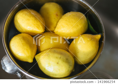 Washing fresh lemons Washing fresh lemons 141966254