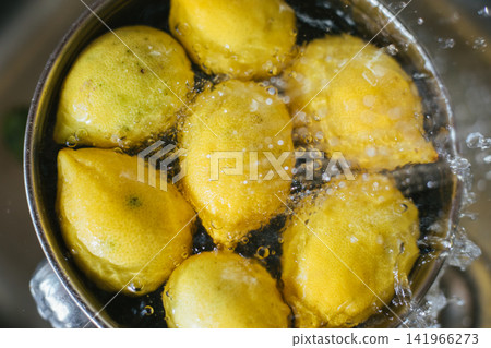 Washing fresh lemons Washing fresh lemons 141966273