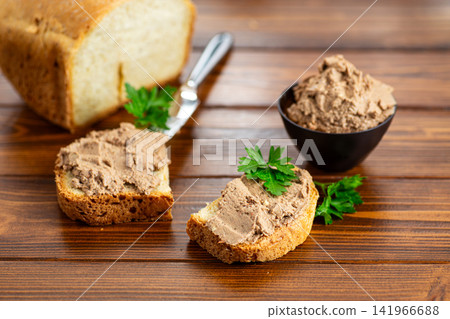 Rustic breakfast sandwiches with creamy pate and parsley Rustic breakfast sandwiches with creamy pate and parsley 141966688