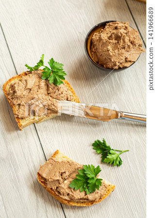 Top view of rustic pate sandwiches on white table Top view of rustic pate sandwiches on white table 141966689