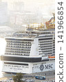 A large cruise ship is currently docked in Kaohsiung, Taiwan. A large cruise ship is currently docked in Kaohsiung, Taiwan. 141966854
