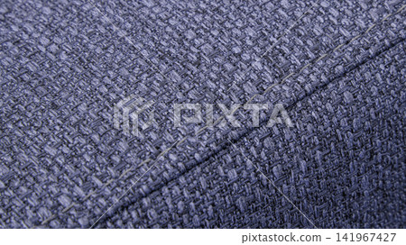 Textured Purple textile background with diagonal stitching Textured Purple textile background with diagonal stitching 141967427