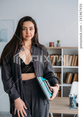 Corporate lifestyle. Employee routine. Stylish business woman confident professional entrepreneur with laptop notebook at modern office. Corporate lifestyle. Employee routine. Stylish business woman confident professional entrepreneur with laptop notebook at modern office. 141967450