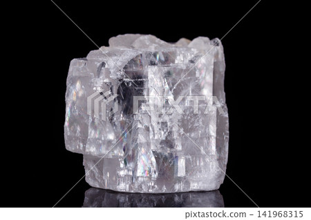 Macro mineral stone Iceland spar on black background Macro mineral stone Iceland spar on black background 141968315