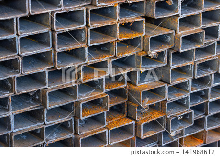 Close-Up of Stacked Rusty Metal Tubes Close-Up of Stacked Rusty Metal Tubes 141968612