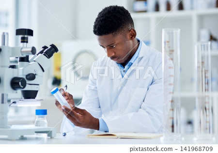 Science, laboratory and black man with test tube for medical analysis, research and microscope. Healthcare, biotechnology and scientist with sample container for experiment, medicine and development Science, laboratory and black man with test tube for medical analysis, research and microscope. Healthcare, biotechnology and scientist with sample container for experiment, medicine and development 141968709
