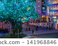 The city lights at night and the illuminated trees 141968846