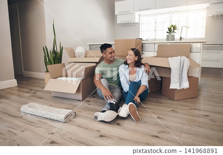 Break, couple and happy in new home with boxes for moving in, satisfied and confident with ownership. House,.relationship and smile with unpacking furniture, excited and positive with property Break, couple and happy in new home with boxes for moving in, satisfied and confident with ownership. House,.relationship and smile with unpacking furniture, excited and positive with property 141968891