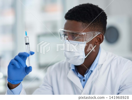 Black man, needle or scientist in mask for science innovation, vaccine or antiaging medicine chemical. Injection, medical or African biologist with chemistry in research or life extension test in lab Black man, needle or scientist in mask for science innovation, vaccine or antiaging medicine chemical. Injection, medical or African biologist with chemistry in research or life extension test in lab 141968928