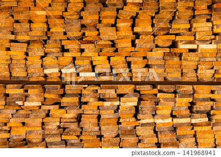 Stacked Wooden Planks Texture Background Stacked Wooden Planks Texture Background 141968941