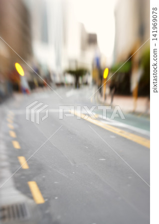City, blurred and downtown street for morning commute with buildings, asphalt and social migration. Traffic, light and empty road with motion for urban travel, infrastructure and transport in London. City, blurred and downtown street for morning commute with buildings, asphalt and social migration. Traffic, light and empty road with motion for urban travel, infrastructure and transport in London. 141969078