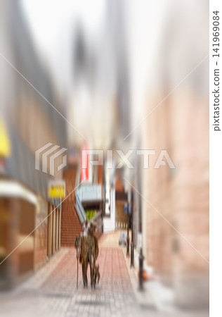 City, blurred and person walking on street for morning commute with buildings, downtown and social migration. Society, alley and people on sidewalk with motion, urban travel and culture in London. City, blurred and person walking on street for morning commute with buildings, downtown and social migration. Society, alley and people on sidewalk with motion, urban travel and culture in London. 141969084