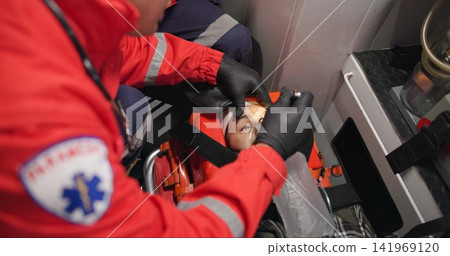 Patient, paramedic and shine light into eyes to check pupil, test and first aid. Hands, medical professional and flashlight to woman, unconscious and rescue for health, emergency or help in ambulance Patient, paramedic and shine light into eyes to check pupil, test and first aid. Hands, medical professional and flashlight to woman, unconscious and rescue for health, emergency or help in ambulance 141969120