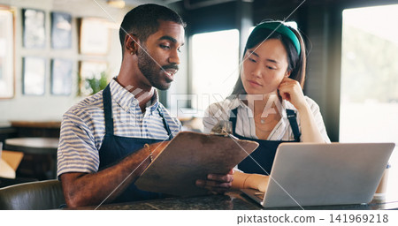 Business owner, teamwork and computer for restaurant profit, sales and stock inventory management on a checklist. Man, waiter and manager with documents, laptop and planning budget in a startup cafe 141969218