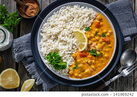 indian chole masala with white rice dish indian chole masala with white rice dish 141969242
