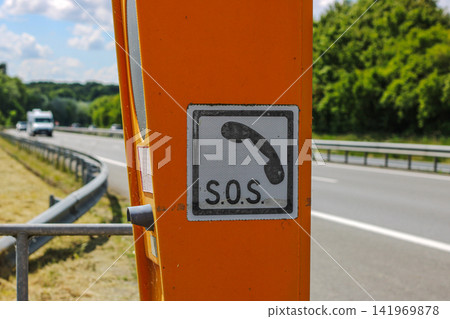 Emergency SOS telephone call box on French highway Emergency SOS telephone call box on French highway 141969878