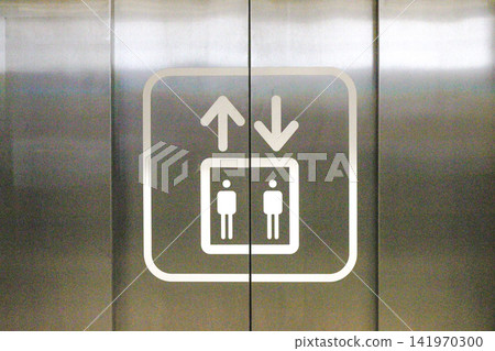 Elevator symbol on stainless steel lift doors Elevator symbol on stainless steel lift doors 141970300