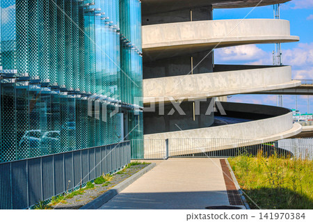 Modern multi level spiral parking garage architecture 141970384