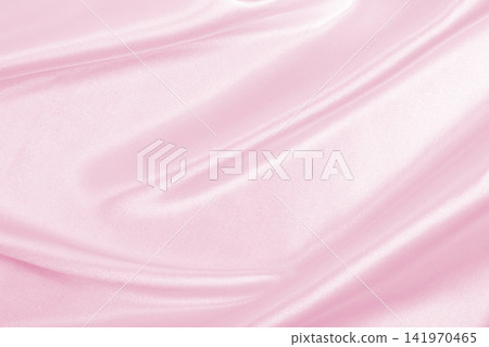 Smooth elegant pink silk or satin texture as wedding background. Luxurious background design Smooth elegant pink silk or satin texture as wedding background. Luxurious background design 141970465