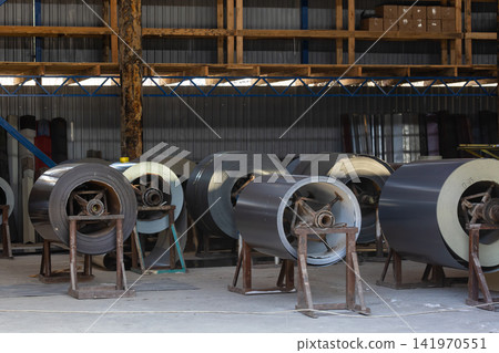 Industrial Warehouse Storage of Metal Coils Industrial Warehouse Storage of Metal Coils 141970551
