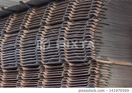 Close-Up of Stacked Corrugated Cardboard Sheets Close-Up of Stacked Corrugated Cardboard Sheets 141970569