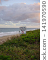 End Of Guarded Beach Sign Among Dune Vegetation 141970590