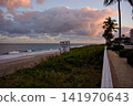 Wooden Boardwalk Path Along Beach Dune At Sunset 141970643
