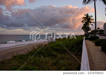 Wooden Boardwalk Path Along Beach Dune At Sunset Wooden Boardwalk Path Along Beach Dune At Sunset 141970643