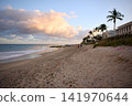 Sandy Beach Path Leading Toward Ocean At Sunset 141970644