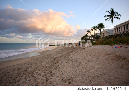 Sandy Beach Path Leading Toward Ocean At Sunset Sandy Beach Path Leading Toward Ocean At Sunset 141970644