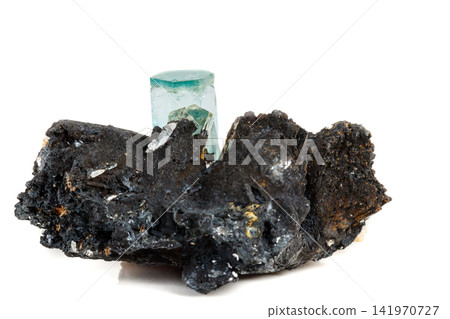 Macro mineral stone Aquamarine and black tourmaline, Schorl on a white background Macro mineral stone Aquamarine and black tourmaline, Schorl on a white background 141970727