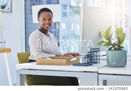 Computer, portrait and black woman in office for creative research with copywriting project. Technology, smile and professional African female writer typing email for content on desktop in workplace. Computer, portrait and black woman in office for creative research with copywriting project. Technology, smile and professional African female writer typing email for content on desktop in workplace. 141970985