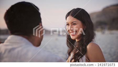 Love, woman and couple at beach with smile, romantic moment and bonding together on summer holiday. Care, partner and people with security, tender connection and happy relationship on outdoor trip. Love, woman and couple at beach with smile, romantic moment and bonding together on summer holiday. Care, partner and people with security, tender connection and happy relationship on outdoor trip. 141971073