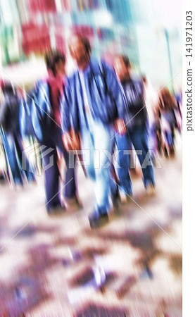 City, blurred and person walking for commute with motion, population crowd and social demographics. Society, men and women on busy street with urban movement, travel culture or community on sidewalk City, blurred and person walking for commute with motion, population crowd and social demographics. Society, men and women on busy street with urban movement, travel culture or community on sidewalk 141971203