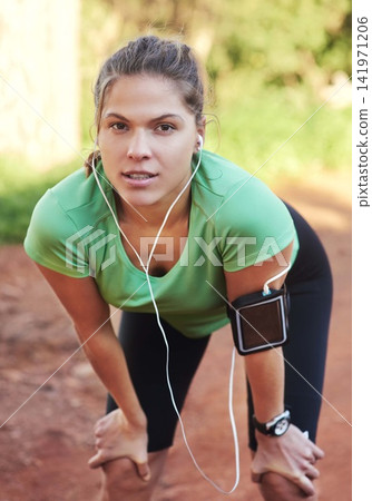 Woman, portrait and running break in nature for fitness, exercise and workout with music on mobile. Young person or runner in Australia with phone for music streaming and outdoor training or cardio Woman, portrait and running break in nature for fitness, exercise and workout with music on mobile. Young person or runner in Australia with phone for music streaming and outdoor training or cardio 141971206