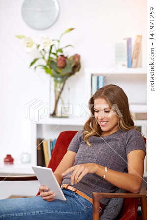 Search, streaming or girl on tablet in home to relax with internet connection for film, video or movie online. Smile, blog and happy woman on social media and technology for subscription in house Search, streaming or girl on tablet in home to relax with internet connection for film, video or movie online. Smile, blog and happy woman on social media and technology for subscription in house 141971259