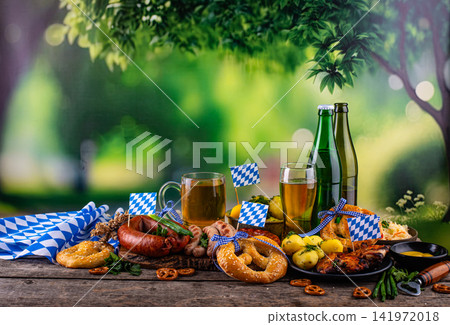 Oktoberfest food: beer, pretzel, sausages, stewed cabbage, potato Oktoberfest food: beer, pretzel, sausages, stewed cabbage, potato 141972018