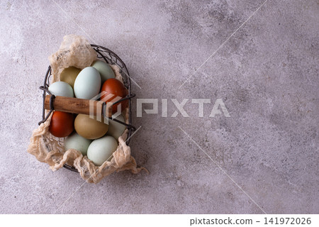 Farm blue, green and brown chicken eggs Farm blue, green and brown chicken eggs 141972026