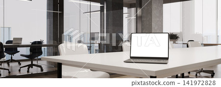 3D Render Modern Office Workspace with Laptop Blank Screen on Conference Table in Glass Partitioned Workplace 3D Render Modern Office Workspace with Laptop Blank Screen on Conference Table in Glass Partitioned Workplace 141972828