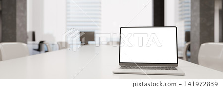 3D Render of Laptop with Blank White Screen on Conference Table in Modern Office Workspace 3D Render of Laptop with Blank White Screen on Conference Table in Modern Office Workspace 141972839