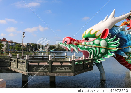 Dragon entrance to the Dragon and Tiger Pagodas at Lotus Pond, a tourist spot in Kaohsiung. 141972850
