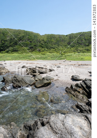 The rocky shores of Jogashima Coast, with its blue sky and endless green meadows. The rocky shores of Jogashima Coast, with its blue sky and endless green meadows. 141972883