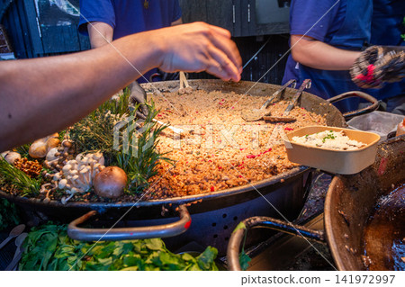 At Borough Market, mushrooms with rice - vegeatarian risotto At Borough Market, mushrooms with rice - vegeatarian risotto 141972997