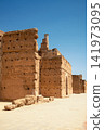 Traditional earthen fortress wall in desert Traditional earthen fortress wall in desert 141973095