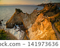 Horse Rock Coast bathed in the setting sun 141973636